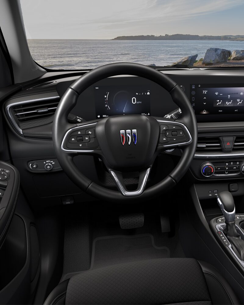 Close-up of the Buick Encore GX Interior Drivers Side View of the Steering Wheel and Dashboard
