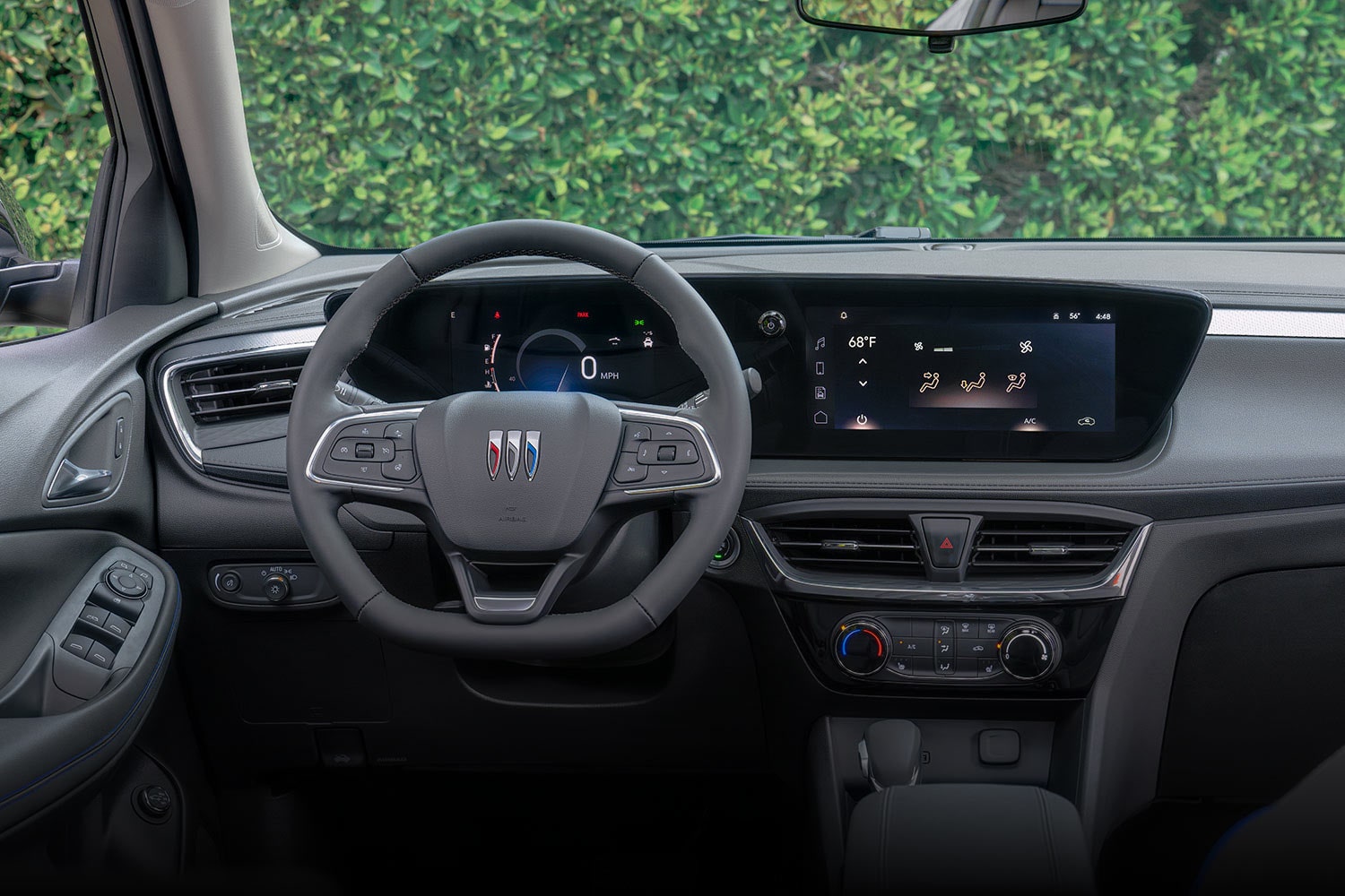 An Interior View of a Buick Dashboard with the Steering Wheel and Infotainment Screen
