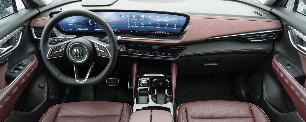 Overhead View of the Steering Wheel and Digital Dashboard in a 2025 Buick Envision ST Sporty SUV