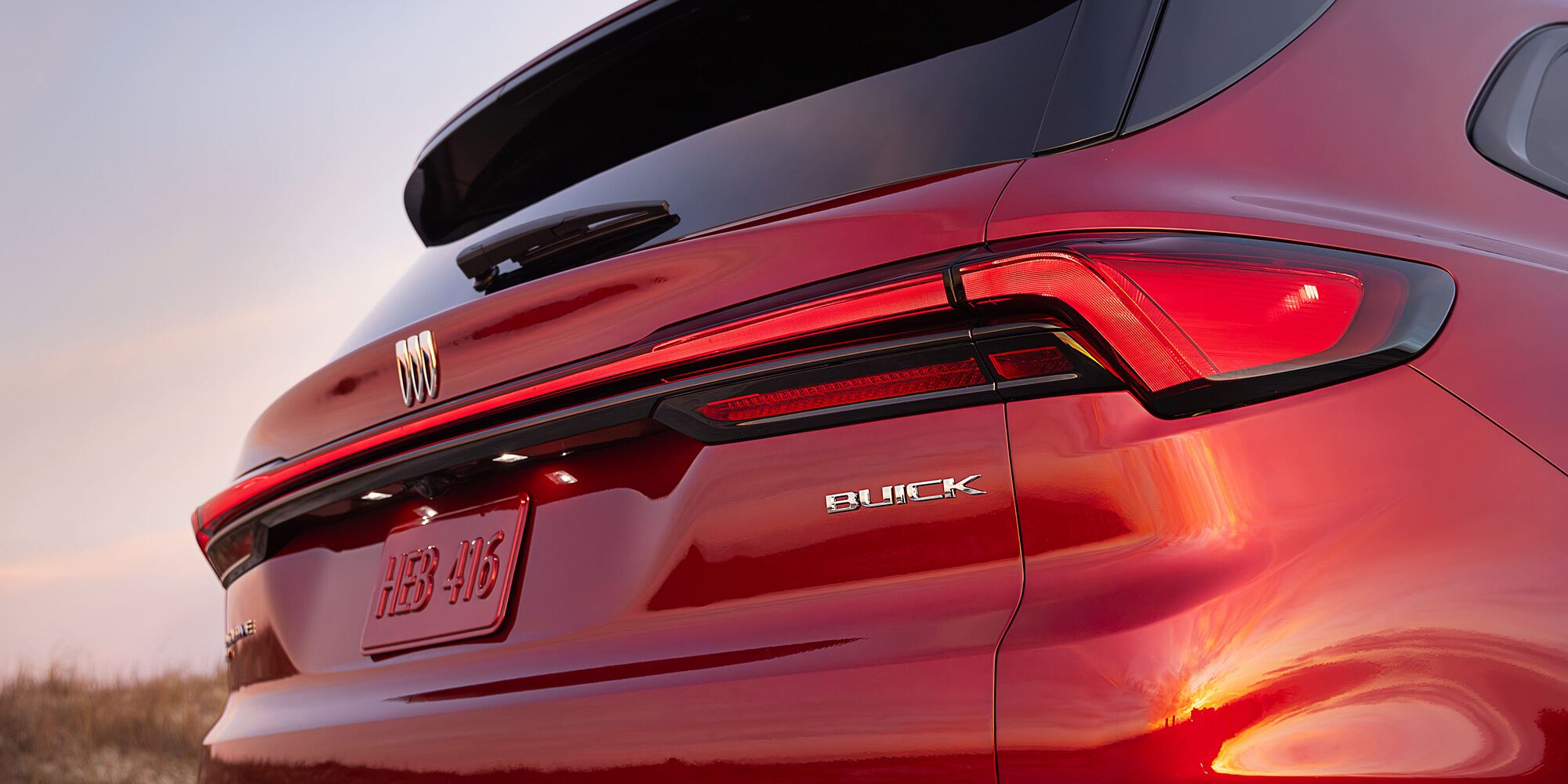 Close-up of the Taillight of a 2026 Red Buick Enclave