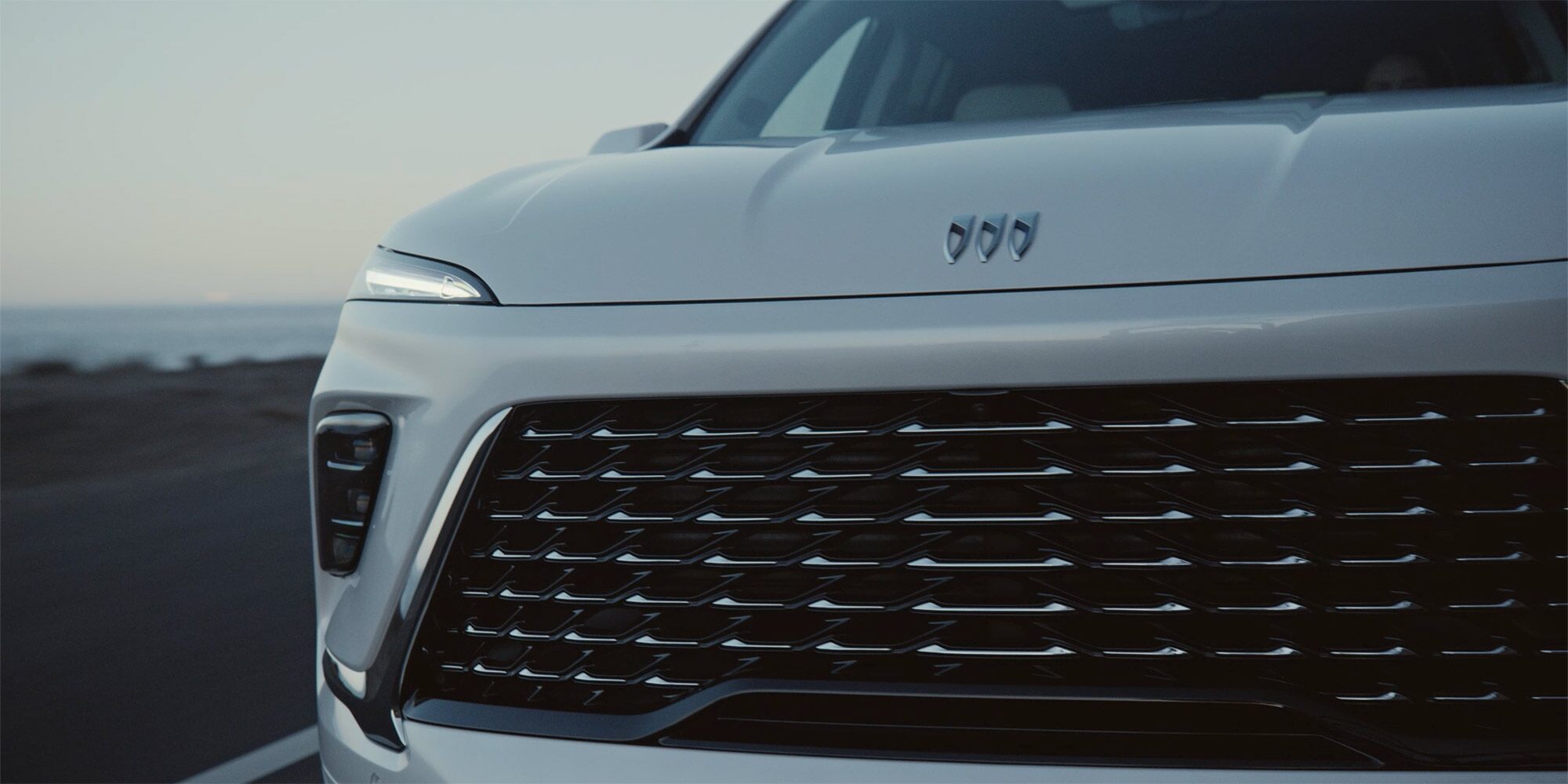 Close-up of the Front Grille of a White 2026 Buick Enclave