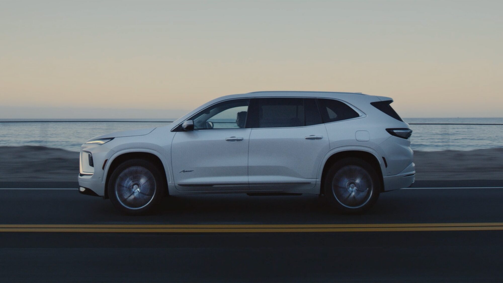 Low Angle Three-Quarters View of a 2026 Buick Enclave Tires and Doors