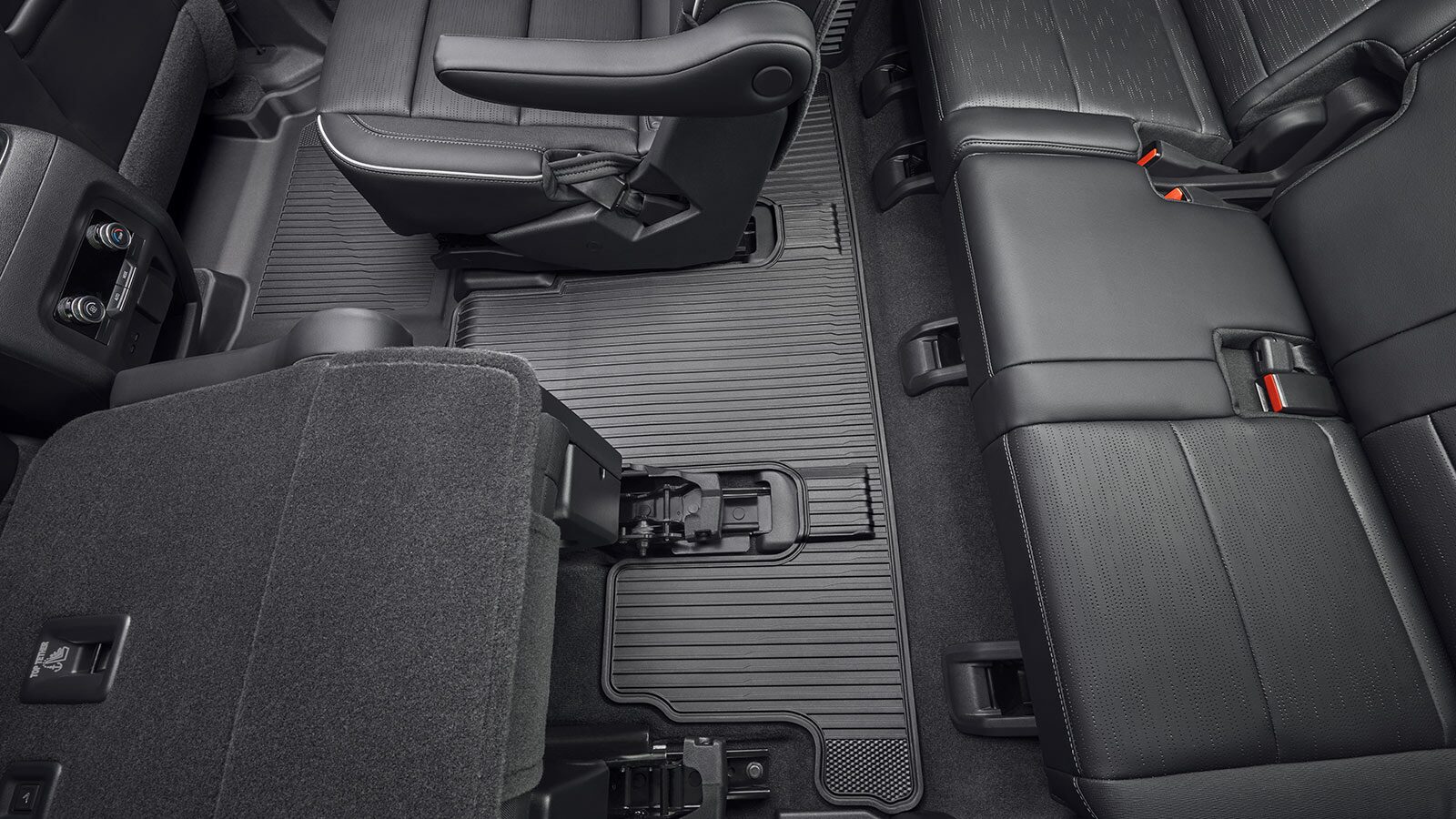 Overhead View of a Black Interior with the Driver’s Seat Folded for a 2026 Buick Enclave