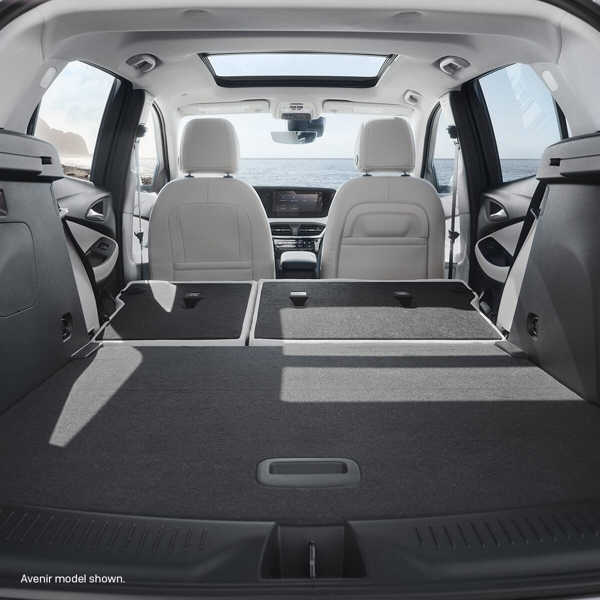 Interior View From the Rear of the Buick 2026 Encore GX Preferred Subcompact SUV with the Rear Seats Folded Down