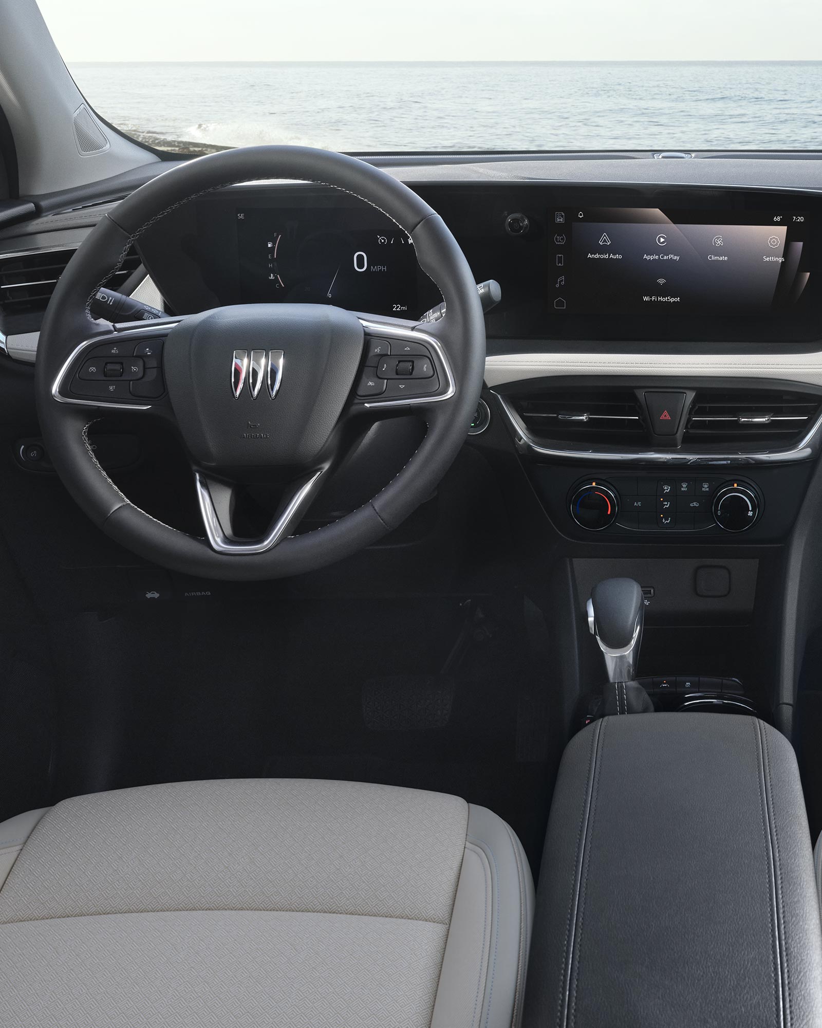 Interior View of the Steering Wheel, Dashboard, and Infotainment Display in the Buick 2026 Encore GX
