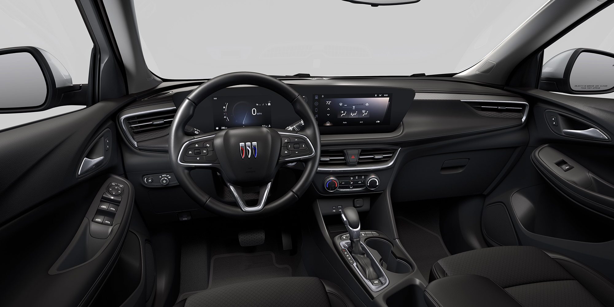 View of the GMC 2026 Buick Encore GX Preferred Subcompact SUV Dark Interior Dashboard, Steering Wheel, and Infotainment Screen