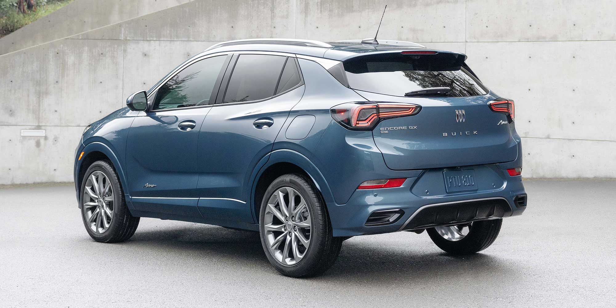 Back-side view of the 2026 Buick Encore GX parked in a driveway.