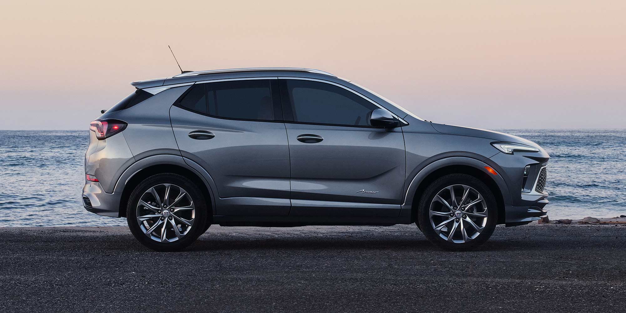 Side view of the 2026 Buick Encore GX parked alone outdoors.