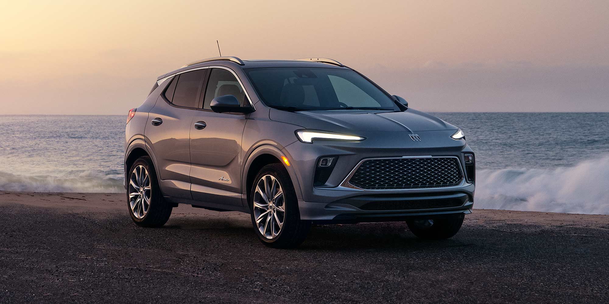 Front-side view of the 2026 Buick Encore GX parked alone outdoors.