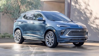 Front-side view of the 2026 Buick Encore GX parked in a home driveway.