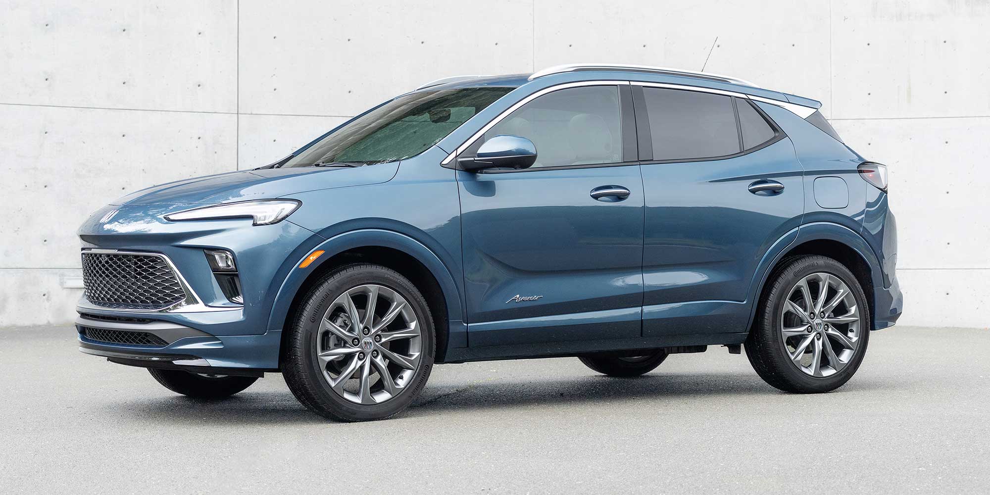 Side view of the 2026 Buick Encore GX parked in a driveway.