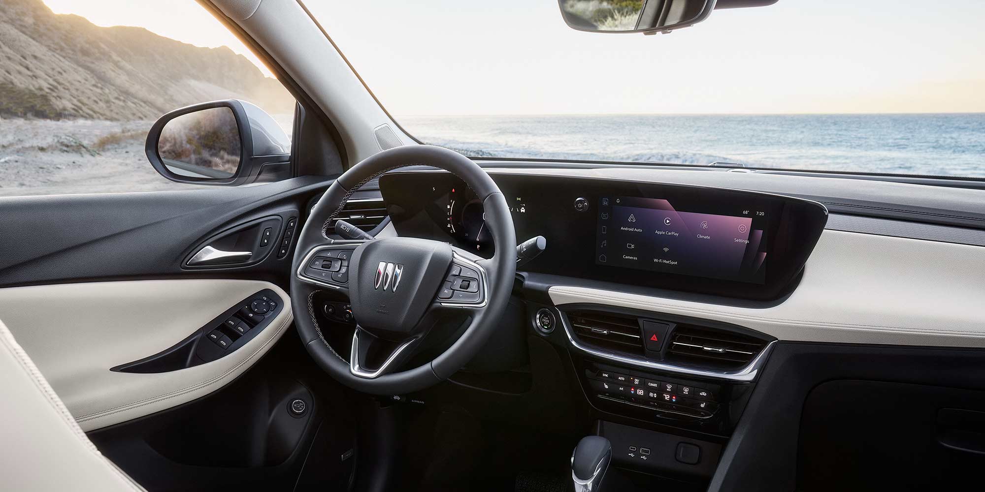 Steering Wheel and infotainment screen inside the 2026 Buick Encore GX.