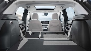 Spacious interiors of the 2026 Buick Encore GX with the rear seats folded down.