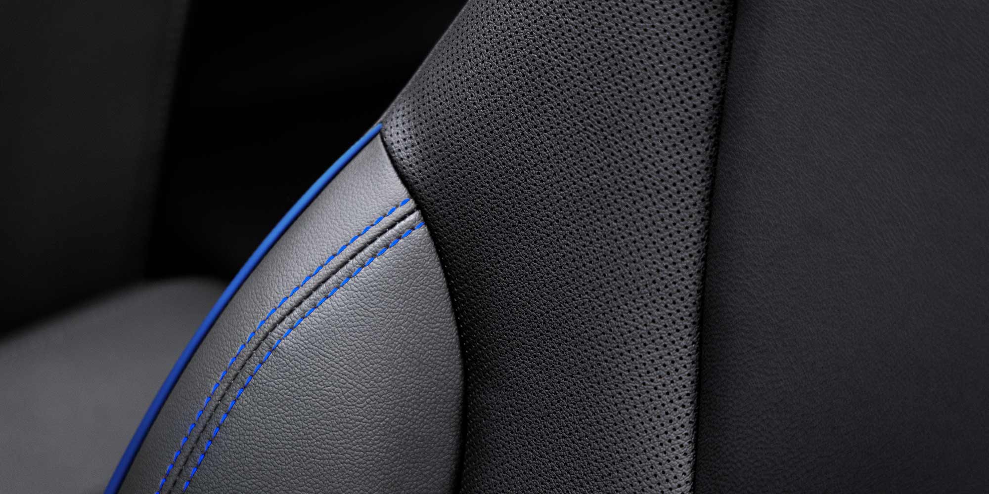 Close up view of the leather stitching on the seats of the 2026 Encore GX.