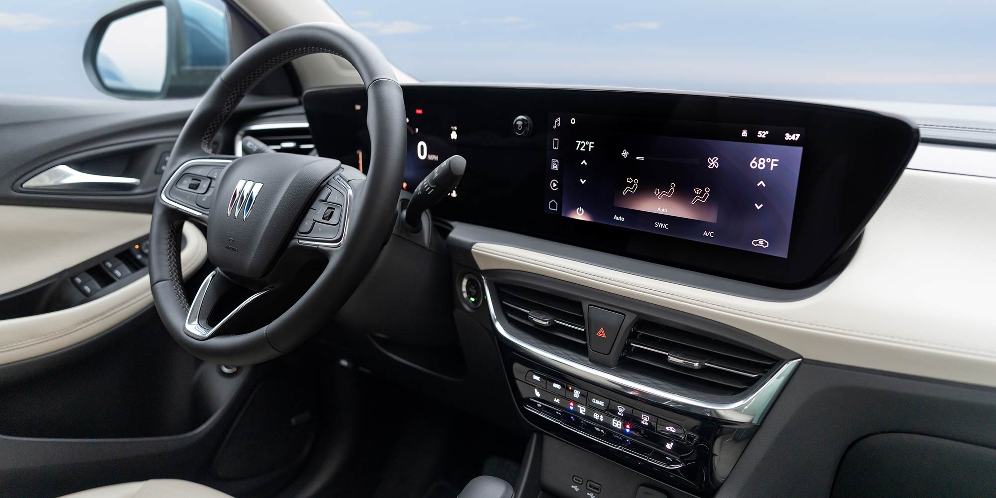 Front passenger's view of the interiors of the 2026 Buick Encore GX Avenir.