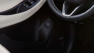 Close up view of the available power liftgate on the driver's door interior of the 2026 Buick Encore GX.