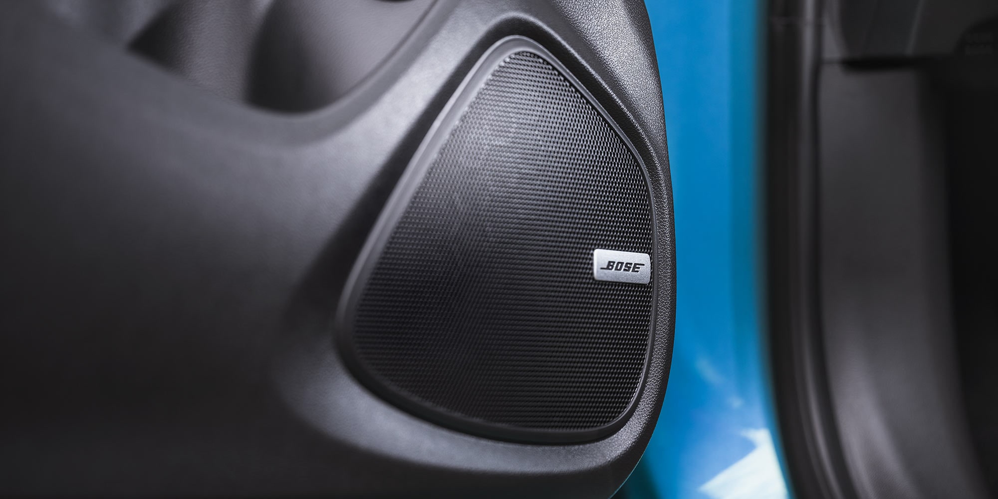 Close up view of the Bose Speaker inside the 2026 Encore GX ST.