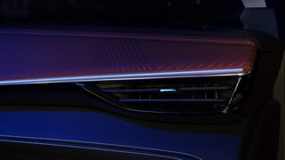Close-up of the Air Vent in the 2026 Buick Envision with a Blue and Purple Hue