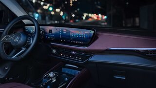 Interior View at Night of the Lite up Dashboard and Infotainments System in the 2026 Buick Envision Compact SUV