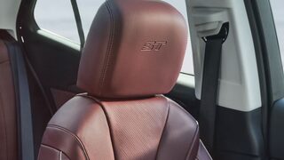 Close-up of the Headrest on the Perforated Leather-Appointed Front Seats in the 2026 Buick Envision ST Sporty Compact SUV