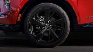 Close-up of the 20 Inch Carbon Flash Metallic Painted Alloy Wheels on the 2026 Buick Envision ST Sporty Compact SUV