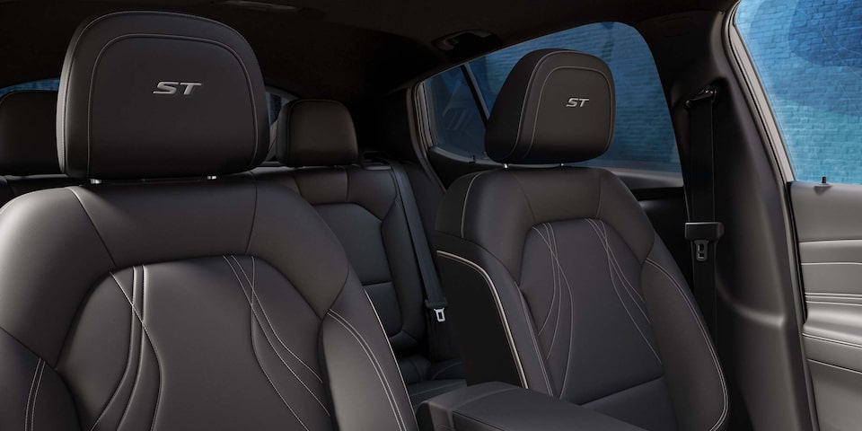 Interior View of the Ebony Seating in the 2026 Envista Sports Touring SUV with ST Stitched in the Headrests