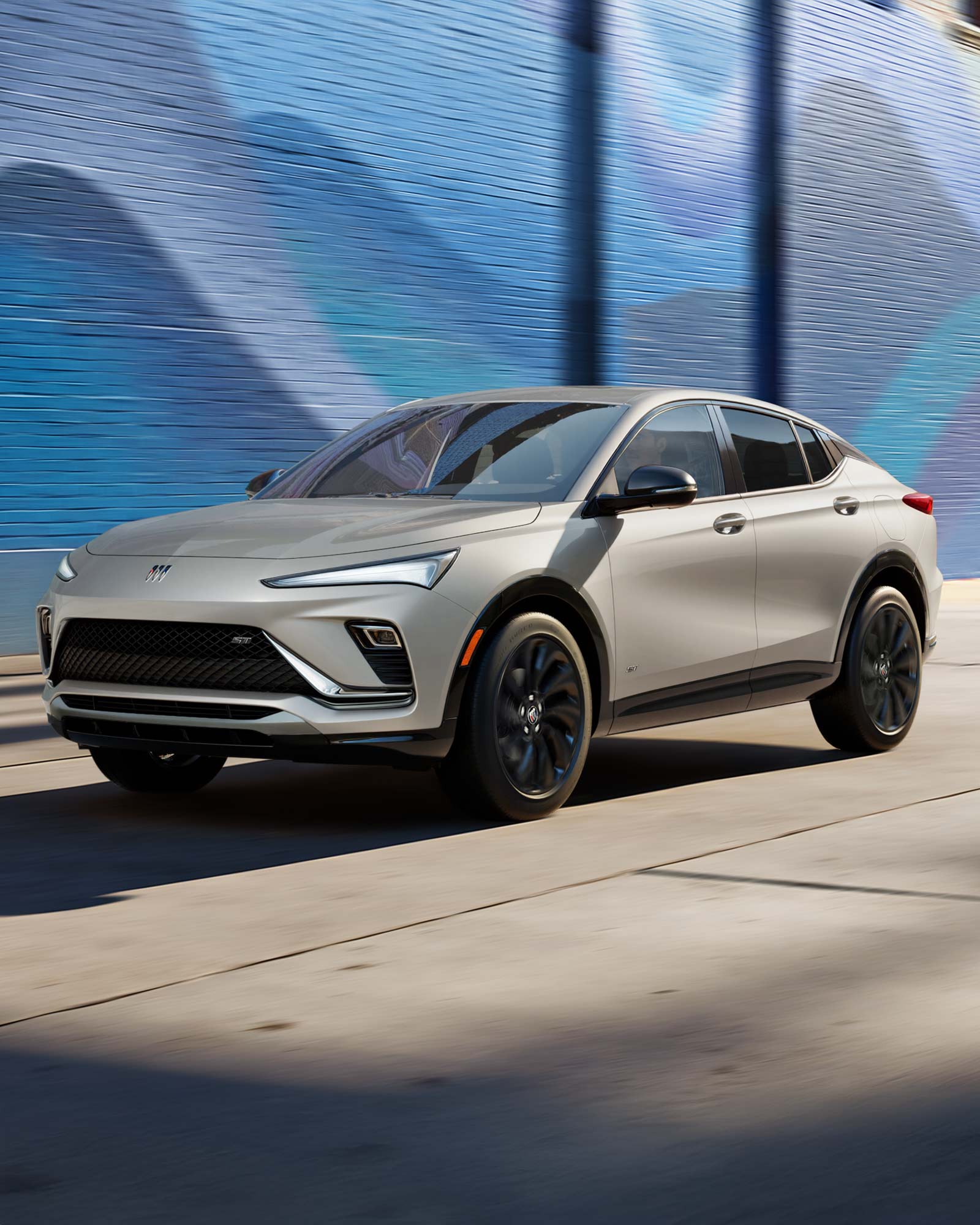 Front View of the 2026 Envista ST SUV with the Studio Series package Driving Down a City Steet