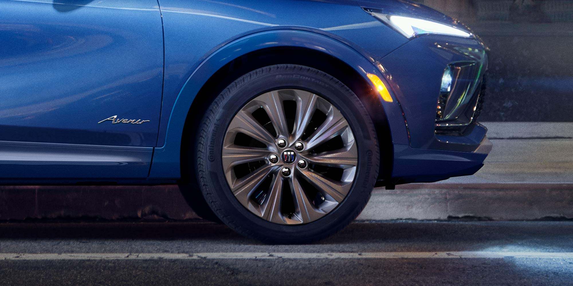 Profile Side View of the Front of a Blue 2026 Buick Envista Compact Crossover