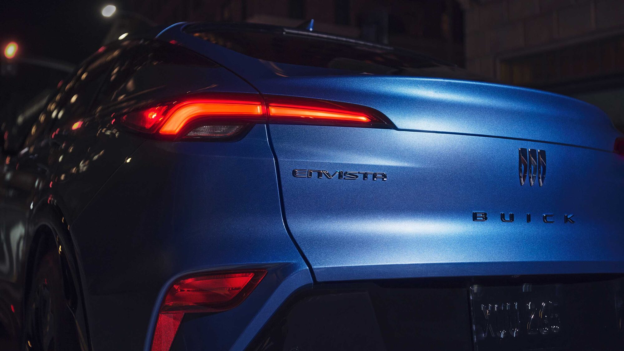 Close-up of the 2026 Buick Envista's Tail Lights on at Night