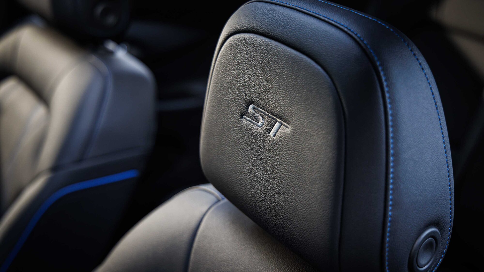 Close-up of the Embroidered ST Logo in the Seating Head Restraint of the 2026 Buick Envista ST