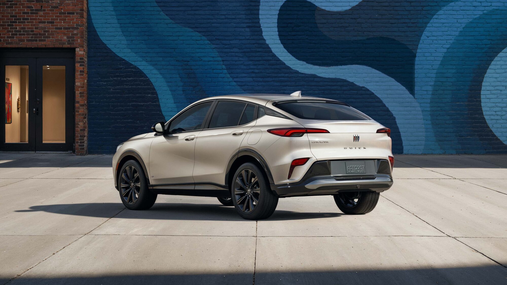 Driver Seat View of the 2026 Buick Envista Cabin and Interior Outlooking the Blurry City at Night