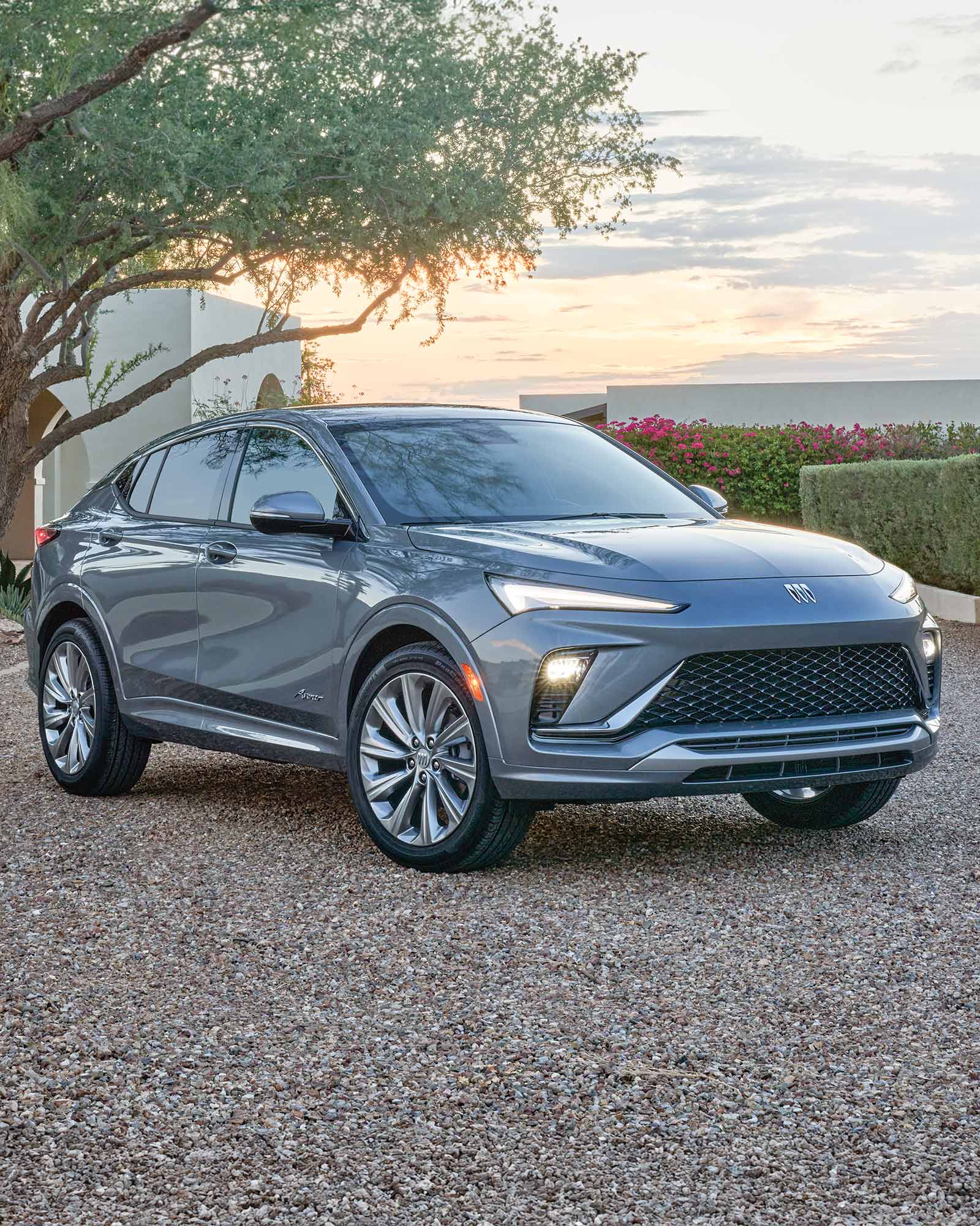 Front View of the 2026 Buick Envista and its Black Ice Chrome Grille Parked Outside of a Home