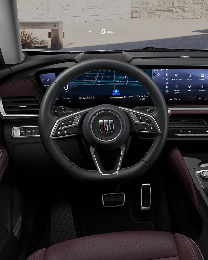 Close-up of the Buick Envision ST Interior Drivers Side View of the Steering Wheel and Dashboard